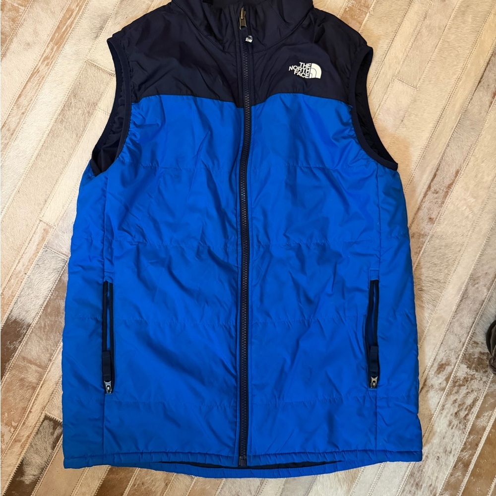 The North Face kids royal blue and dark blue lightweight vest